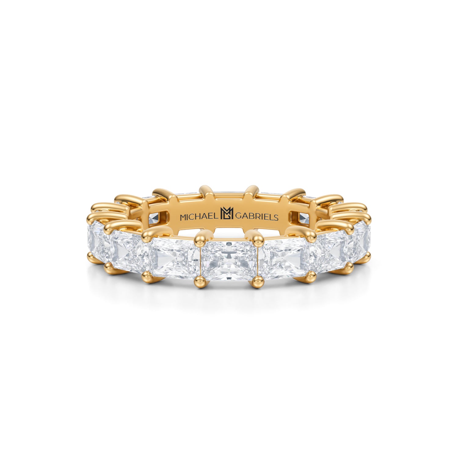 Radiant diamond eternity band in yellow gold.