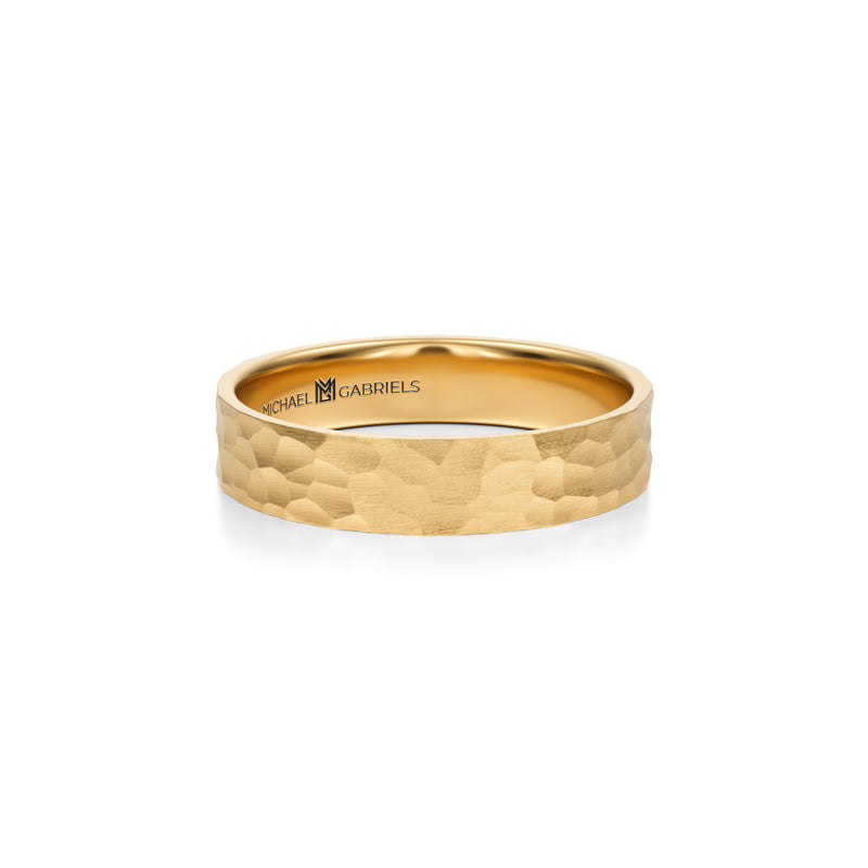 Hammered matte yellow gold wedding band for men.