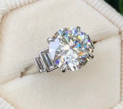Round 3ct E vvs2 w/ 4 baguette side stones size 5  deposit  JN