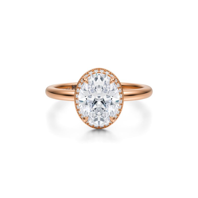 Oval Knife Edge Halo With Solitaire Ring