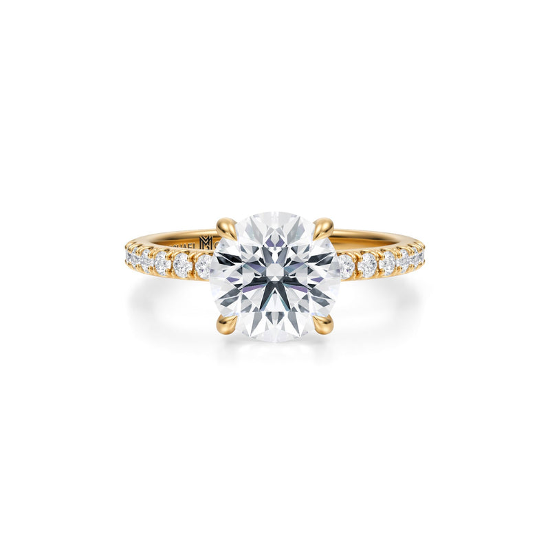 Michael Gabriels round pave ring with pave prongs in yellow gold